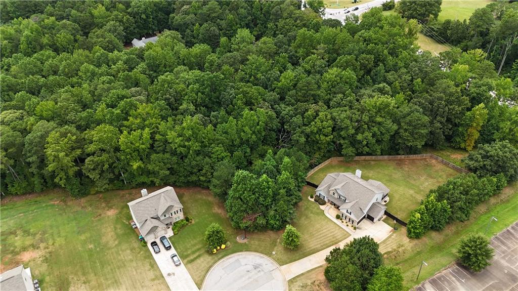 305 Vantage Point Locust Grove, GA 30248 - Photo 6 of 17 an aerial view of a house with swimming pool and outdoor seating