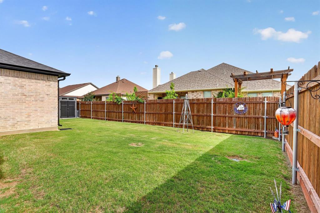 1740 Reverie Road Burleson, TX 76028 - Photo 33 of 37 a view of a garden