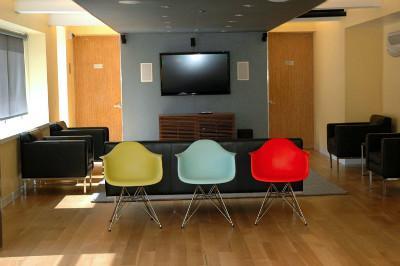 Undisclosed Address Manhattan, NY 10007 - Photo 2 of 15 a living room with furniture and a flat screen tv