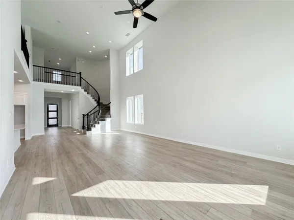 a spacious bathroom with a double vanity sink mirror and