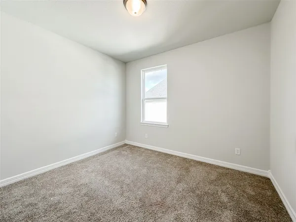 a view of swimming pool with outdoor seating and plants