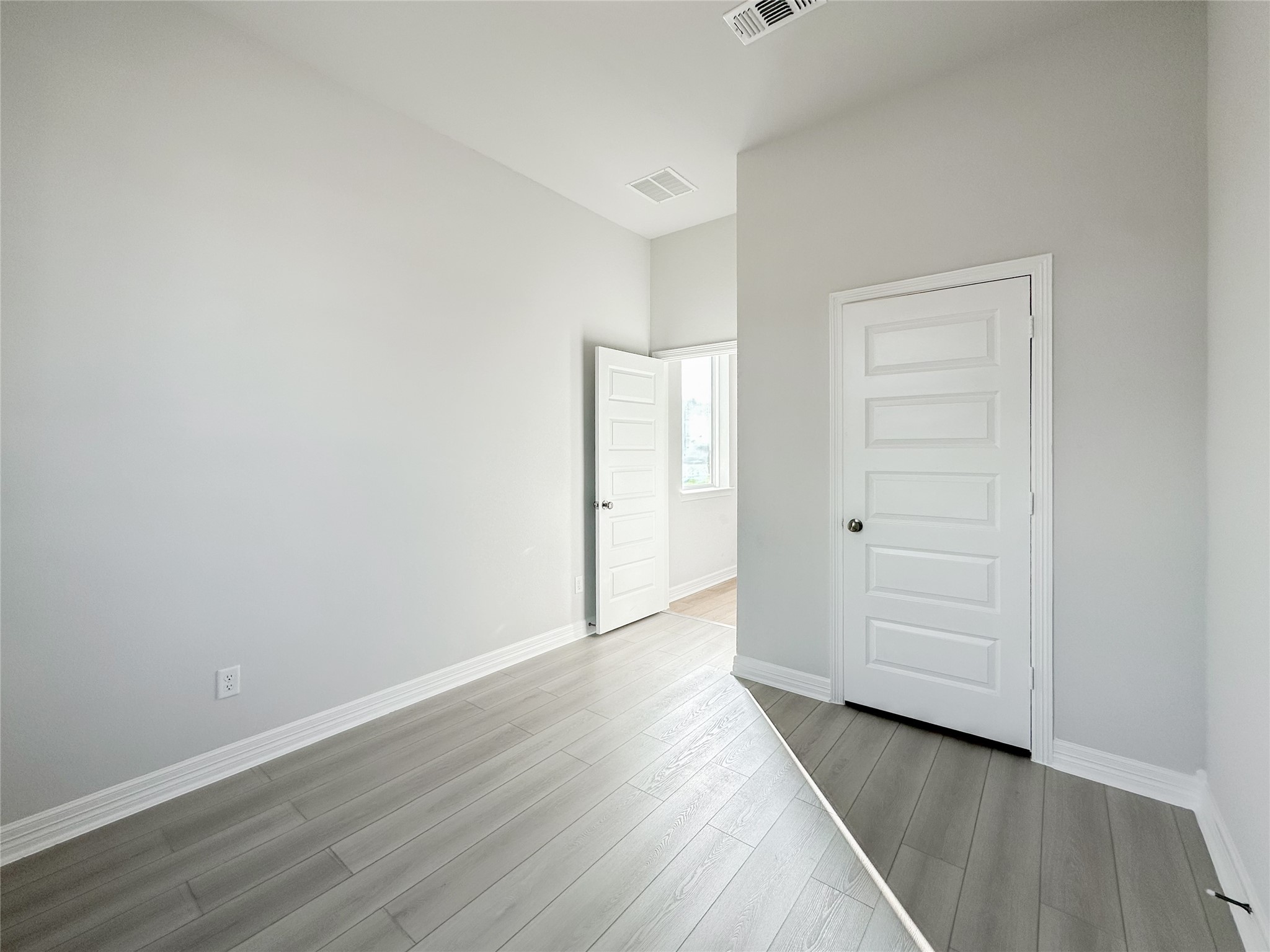 9411 Coleraine Court Tomball, TX 77375 - Photo 3 of 34 an empty room with wooden floor