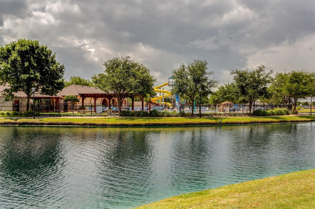 9217 Inverness Drive Rowlett, TX 75089 - Photo 40 of 40 Waterpark Across the Community Lake — Waterview’s private waterpark sits along the community lake, offering a standout neighborhood amenity surrounded by walking paths and scenic water views.