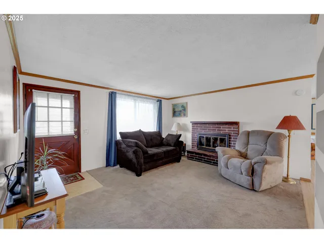 a living room with furniture window and a lamp