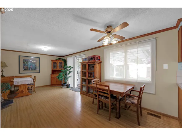 a workspace with furniture window and wooden floor