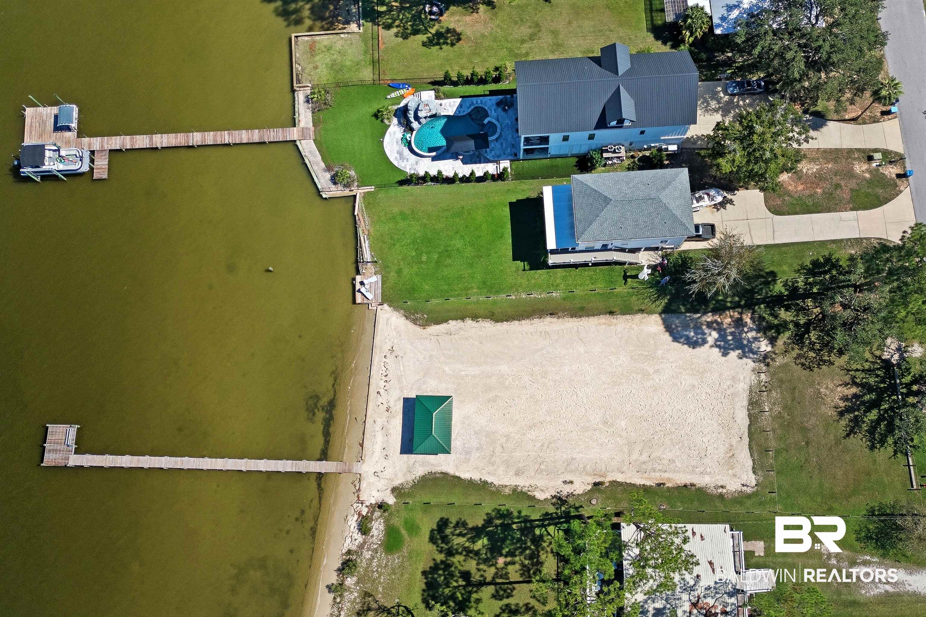 5310 Pine Road Orange Beach, AL 36561 - Photo 46 of 46 Drone / aerial view of a pool area