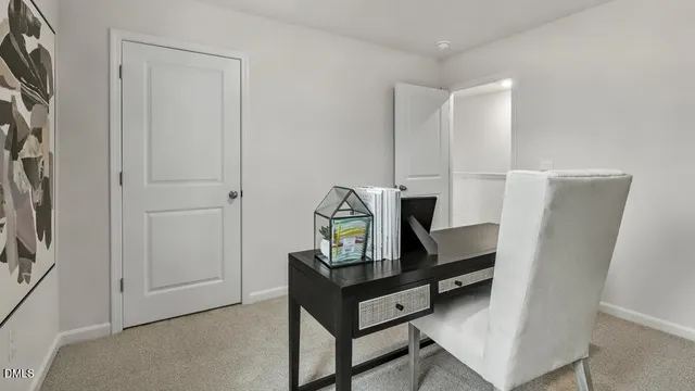a view of living room with furniture and a flat screen tv