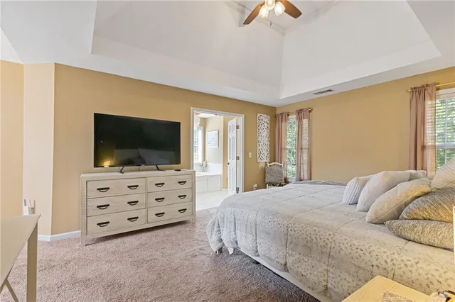a view of a livingroom with furniture and a window