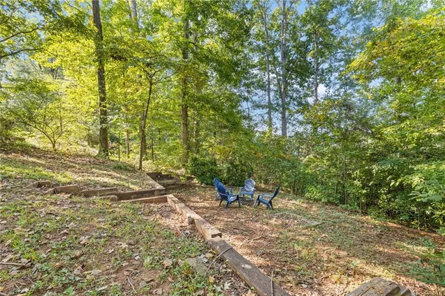a view of a brick building next to a yard