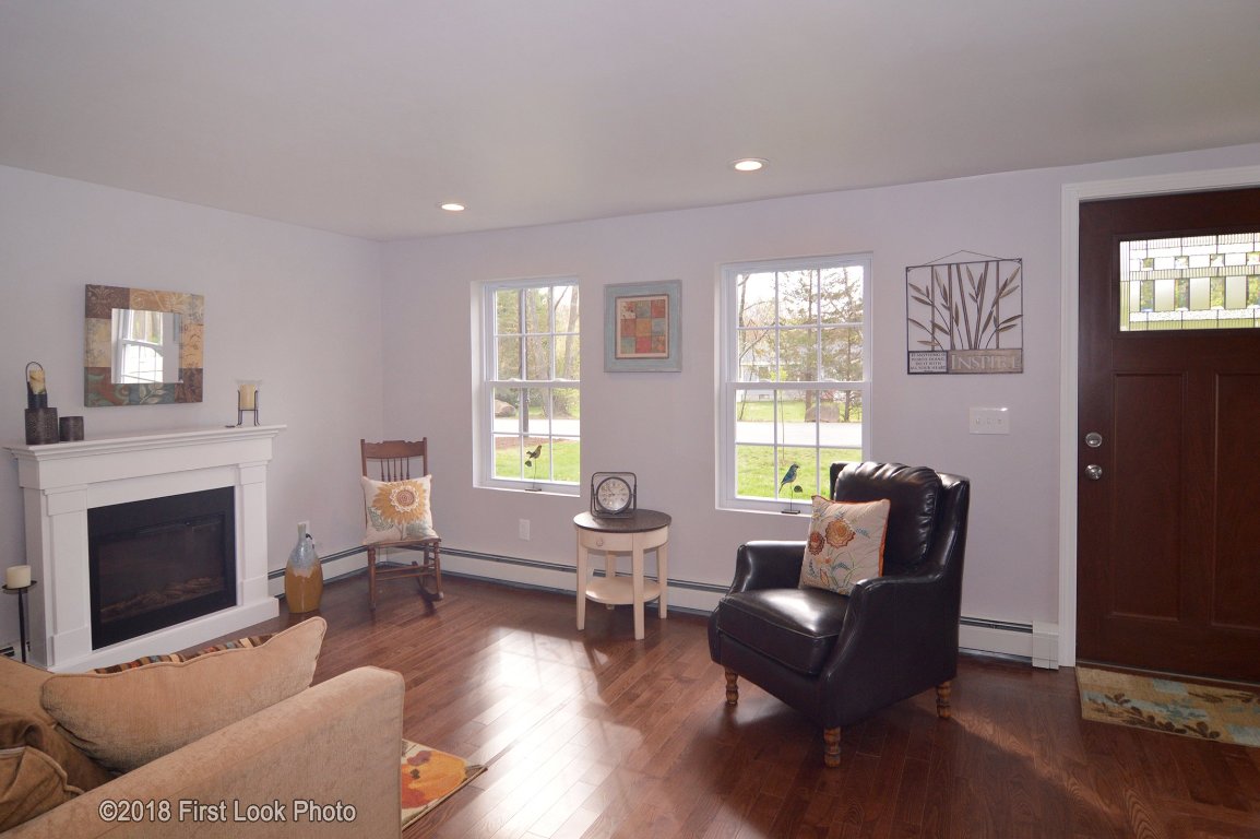 13 Maxson Hill Road Hopkinton, RI 02804 - Photo 4 of 33 Light and bright living room with gleaming hardwood floors