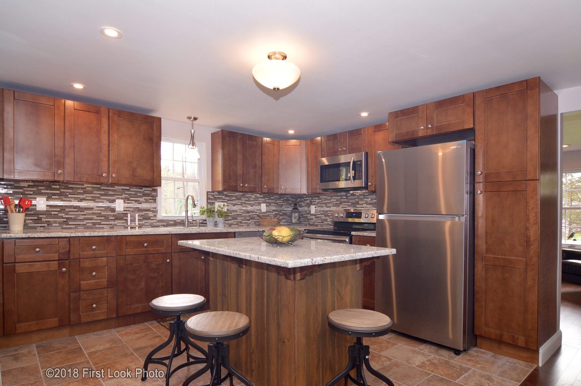13 Maxson Hill Road Hopkinton, RI 02804 - Photo 8 of 33 Loads of countertop space and prep area. center island to add to dining. Gorgeous Shaker Cabinets with a ton of storage, top of the line appliances