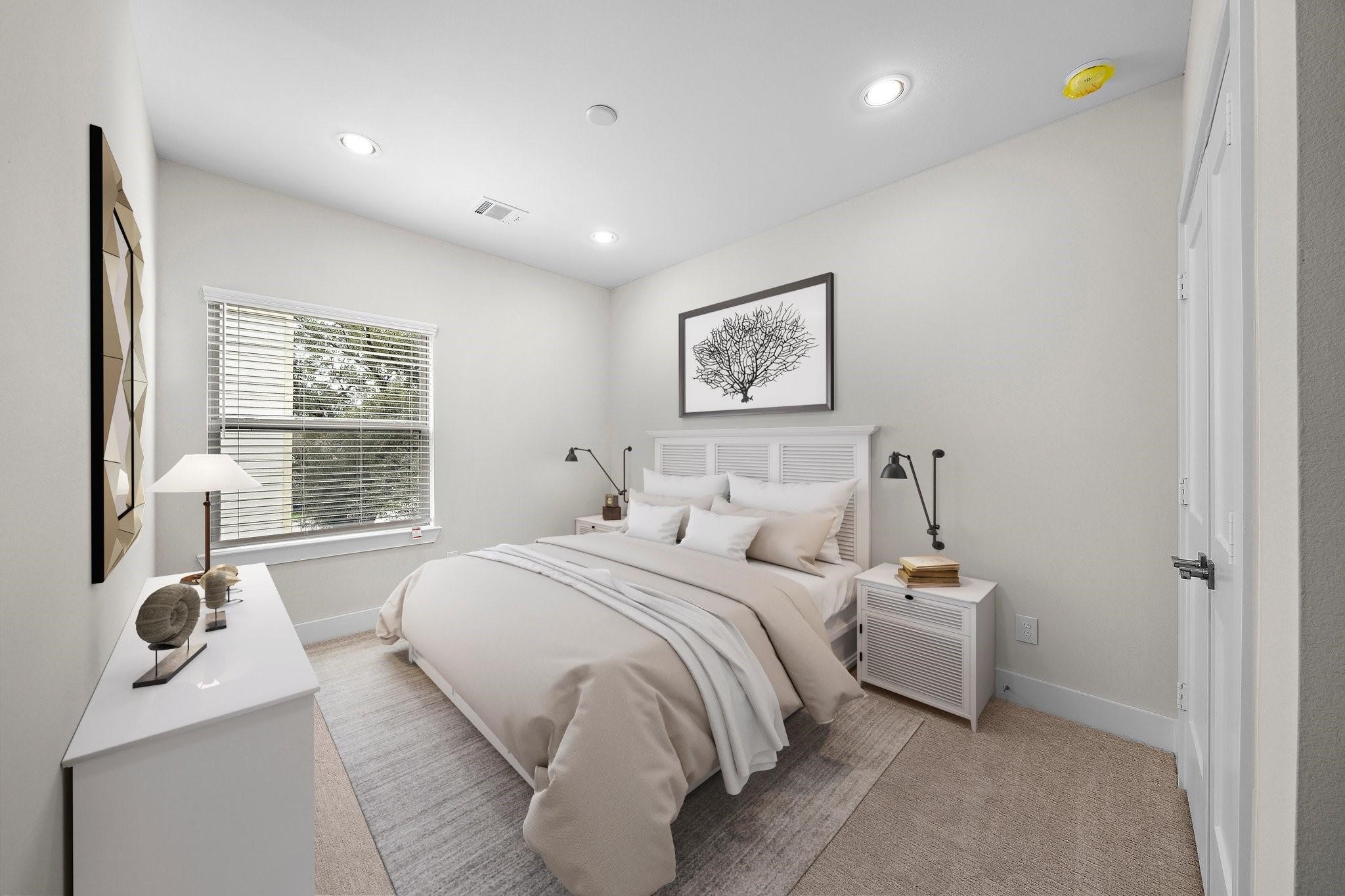 2200 Marnel Road, Unit J Houston, TX 77055 - Photo 18 of 25 a bedroom with a bed and a large window