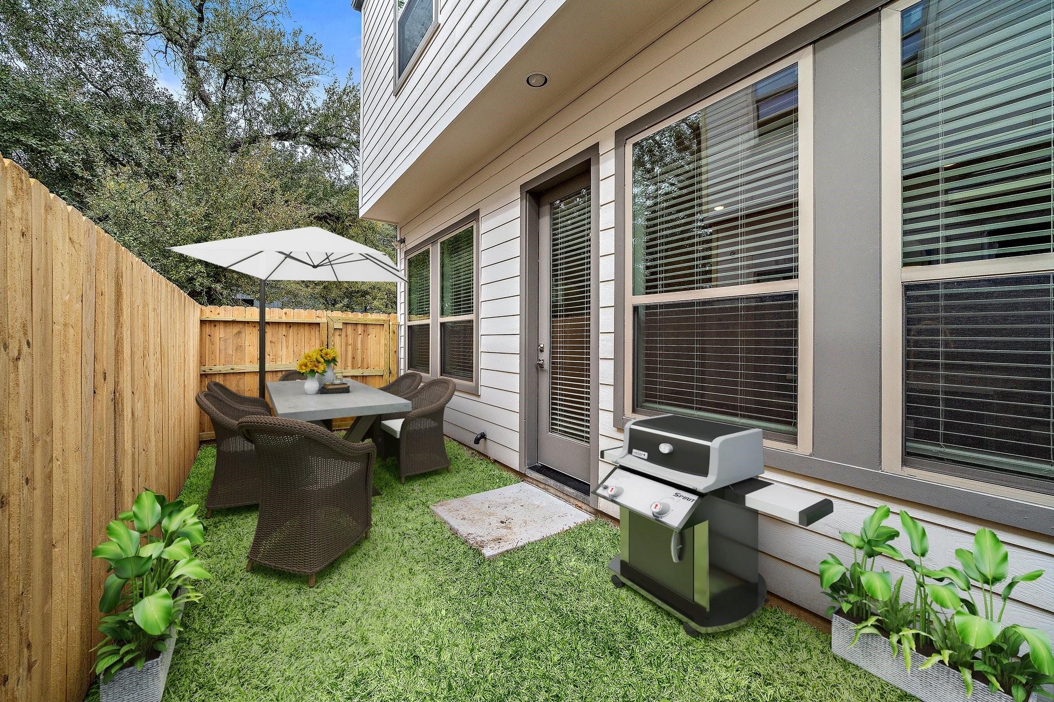 2200 Marnel Road, Unit J Houston, TX 77055 - Photo 21 of 25 a backyard of a house with table and chairs