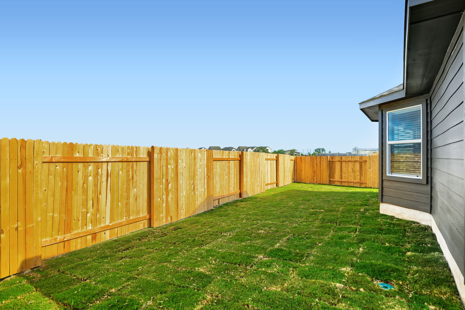 146 Diablo Rim Terrace Dripping Springs, TX 78620 - Photo 29 of 32 A well-maintained lawn provides a private outdoor retreat.