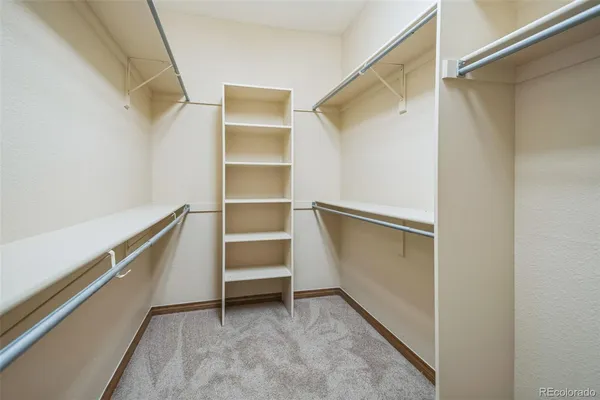 a view of an empty walk in closet