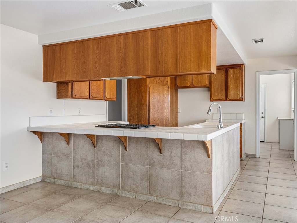 9550 Riggins Road Phelan, CA 92371 - Photo 11 of 47 a bathroom with a sink and a mirror
