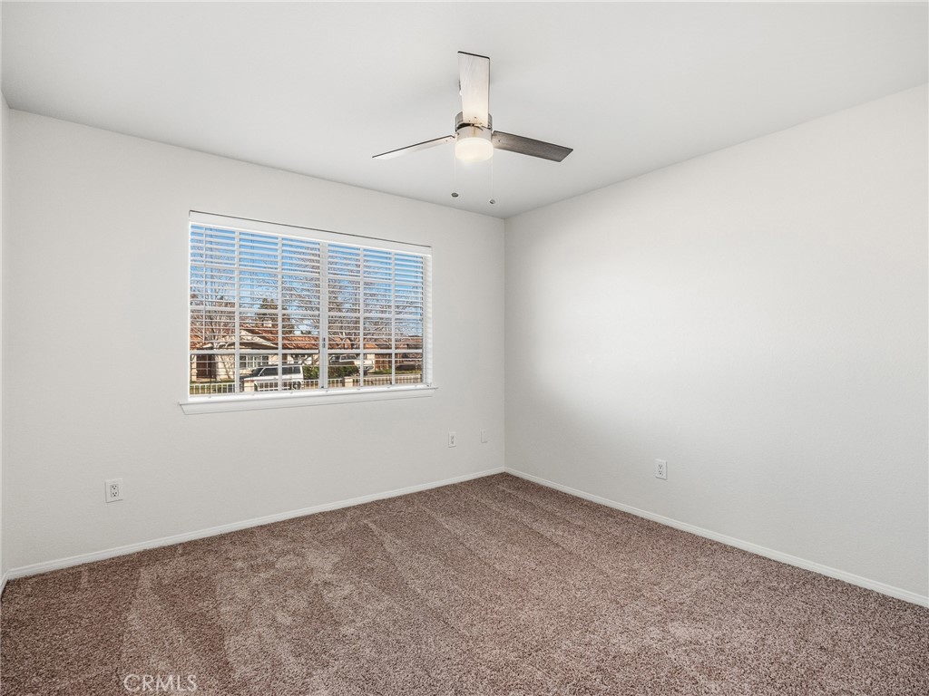 9550 Riggins Road Phelan, CA 92371 - Photo 25 of 47 an empty room with a window
