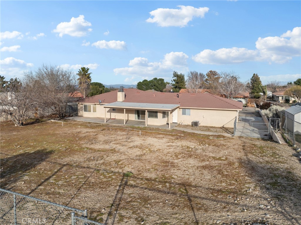 9550 Riggins Road Phelan, CA 92371 - Photo 34 of 47 a view of a house with a yard