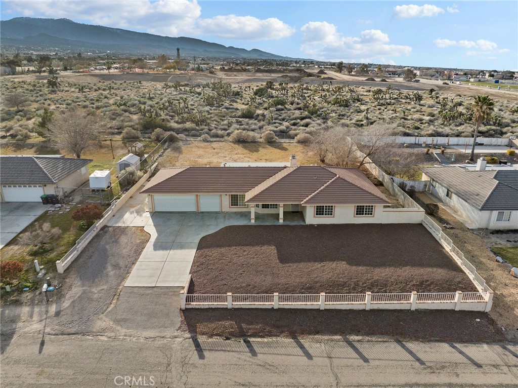 9550 Riggins Road Phelan, CA 92371 - Photo 38 of 47 a view of a house with a yard