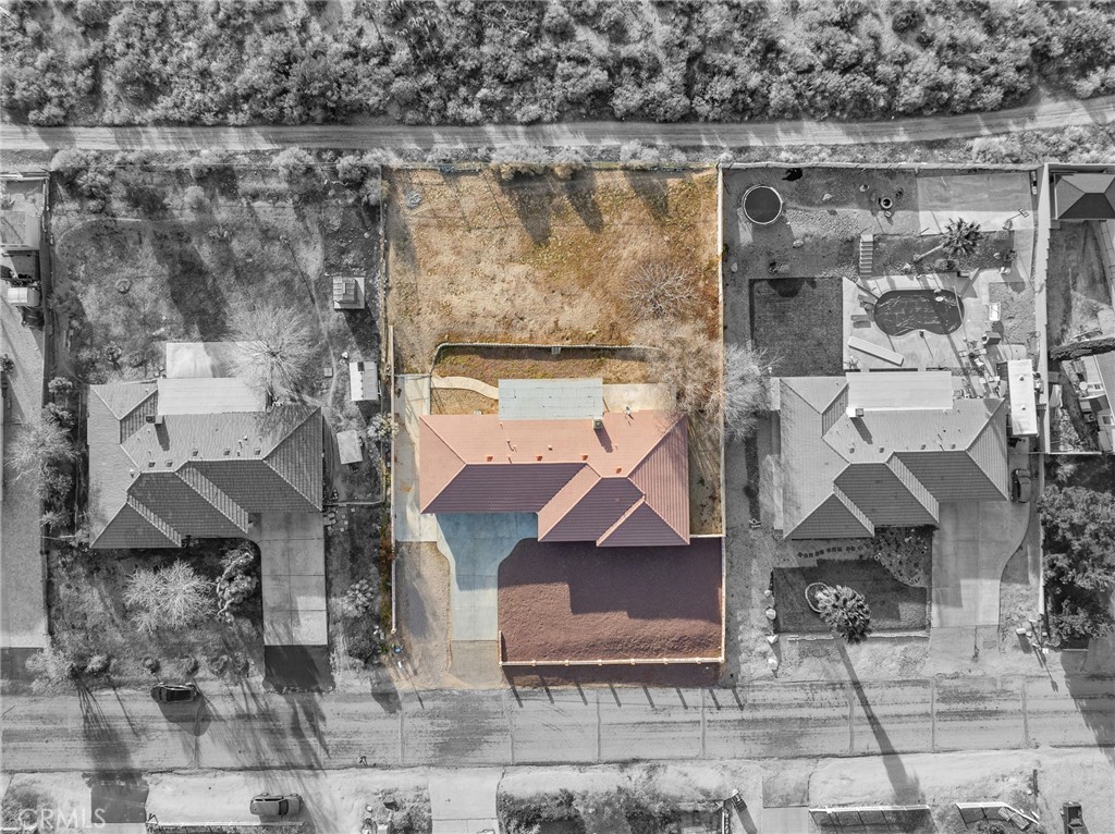 9550 Riggins Road Phelan, CA 92371 - Photo 45 of 47 a aerial view of a house with a yard and sitting area