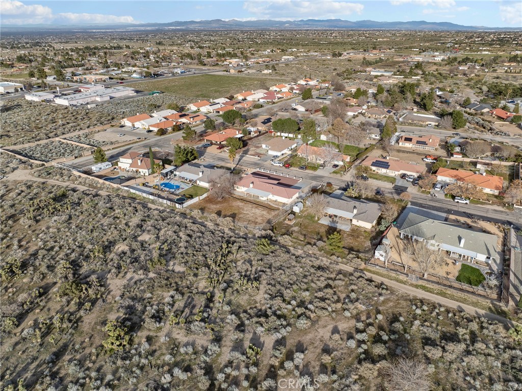 9550 Riggins Road Phelan, CA 92371 - Photo 46 of 47 an aerial view of residential houses with outdoor space