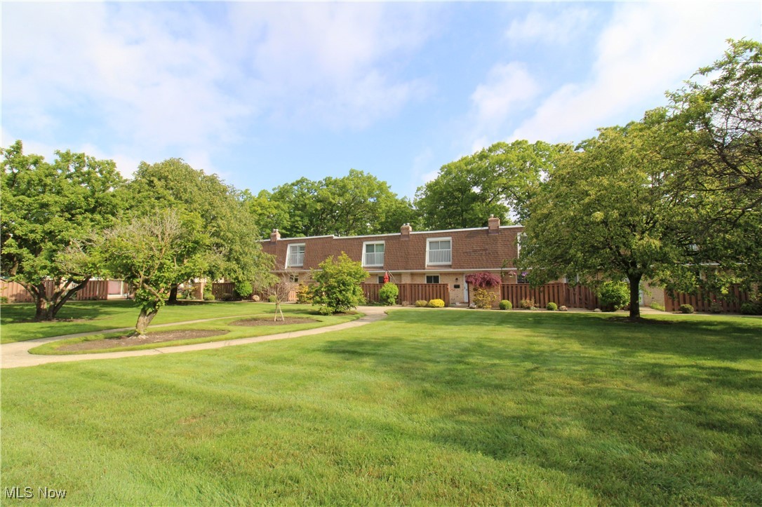 Front view of Condos with Trees and Walk Ways