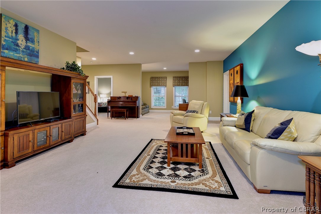 4235 Old Lock Road Williamsburg, VA 23188 - Photo 24 of 46 The options are endless in the lower level. The 'flex' space also includes a office/gym/craft room space.