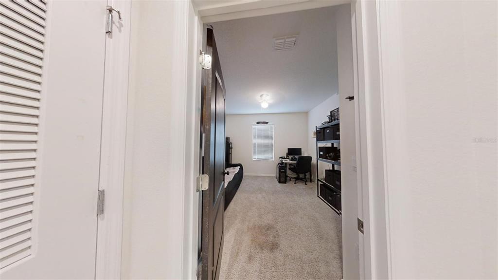 1818 Myrtlebrooke Drive Edgewater, FL 32141 - Photo 15 of 23 a view of a room with a furniture and a window