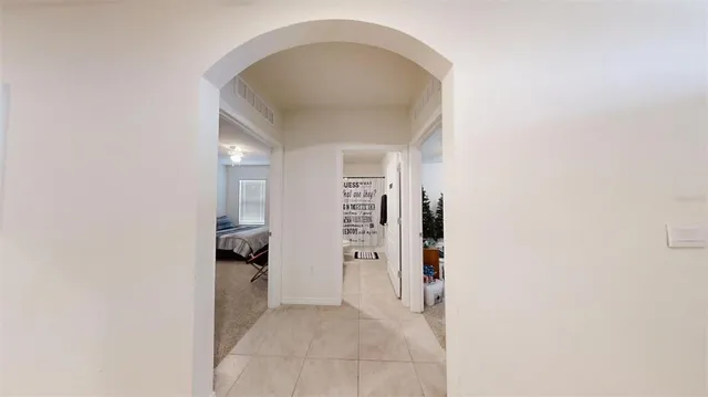 a bedroom with a bed and dresser