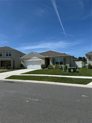 a house view with a garden space