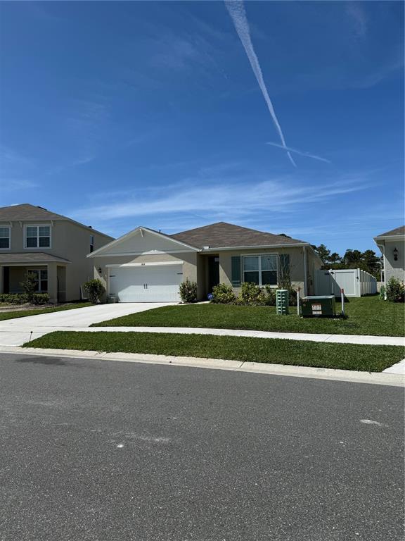 1818 Myrtlebrooke Drive Edgewater, FL 32141 - Photo 2 of 23 a house view with a garden space
