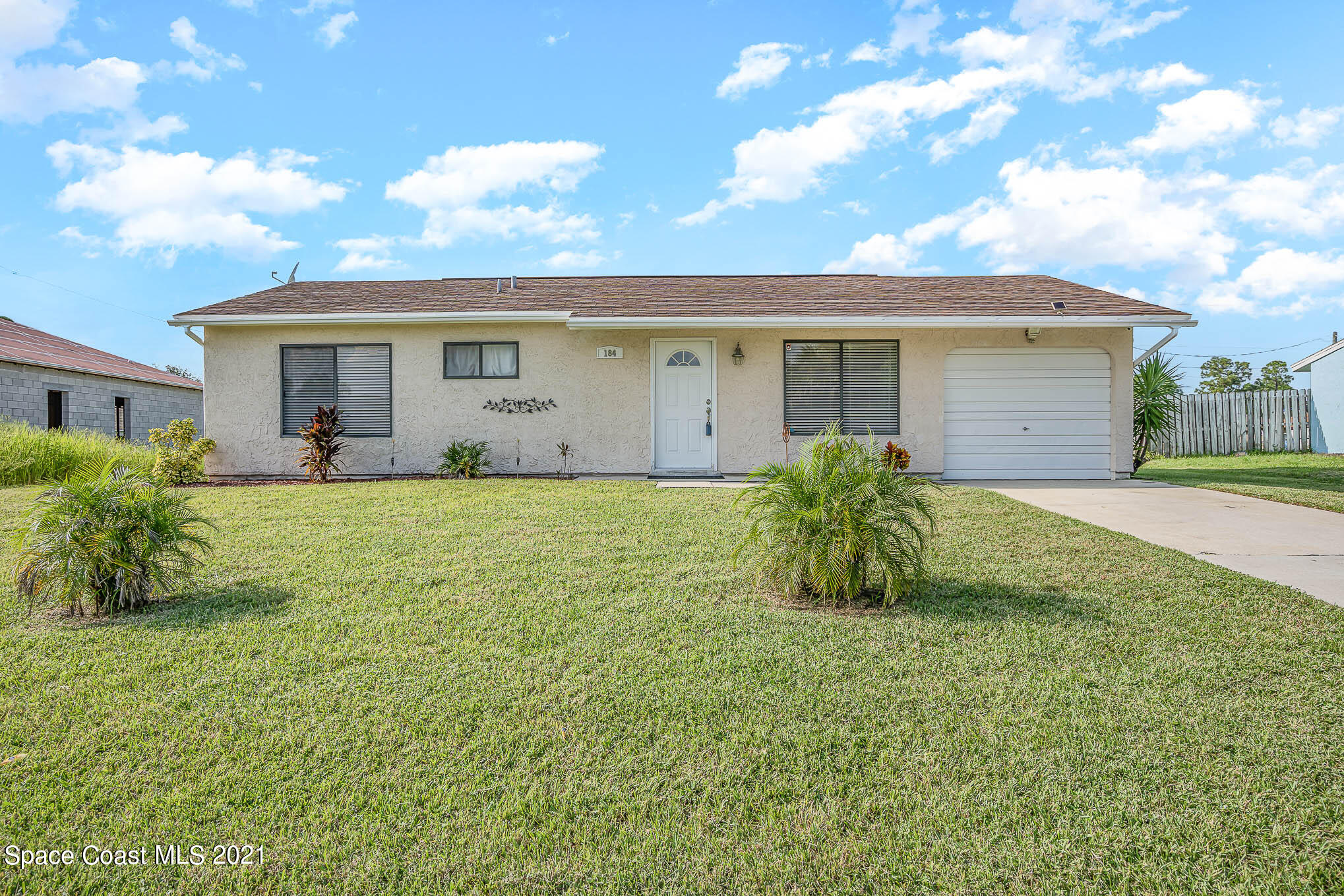 184 Abalone Road Northwest Palm Bay, FL 32907 - Photo 1 of 17 MAS05284-Edit