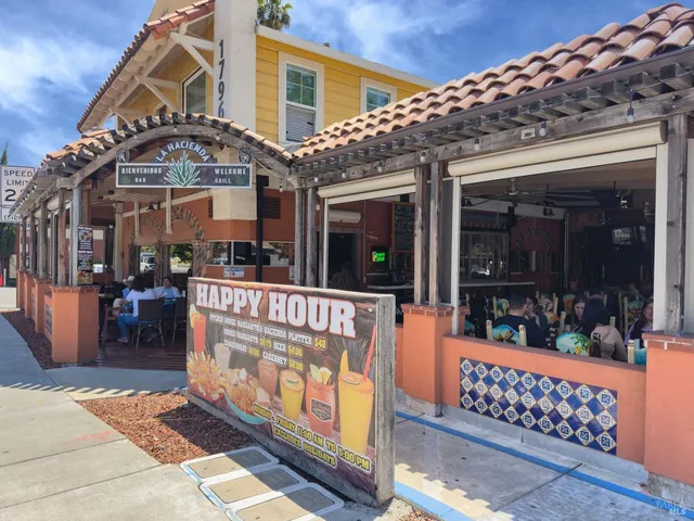 an outdoor space with lots of furniture and shower