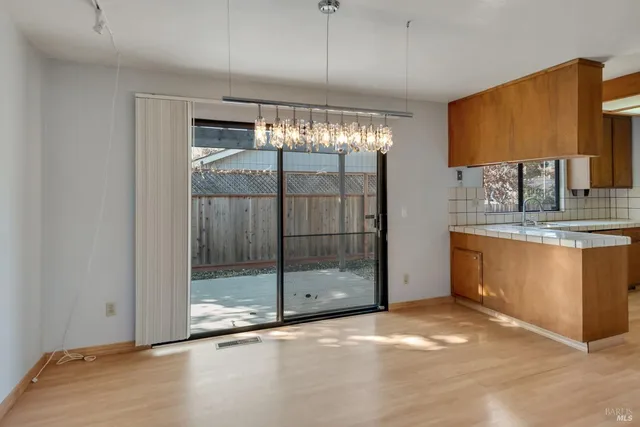 a view of a bathroom with a sink and a mirror