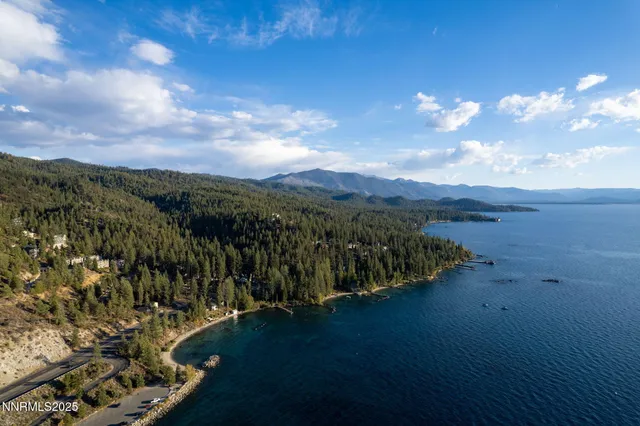 a view of a house with a tree
