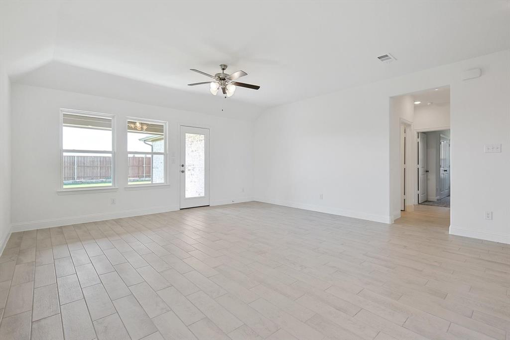 321 Portina Drive Anna, TX 75409 - Photo 16 of 35 a view of empty room with windows