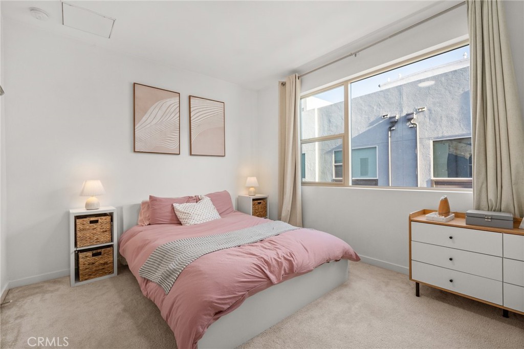 217 Placemark Irvine, CA 92614 - Photo 21 of 39 a bedroom with a bed and a window