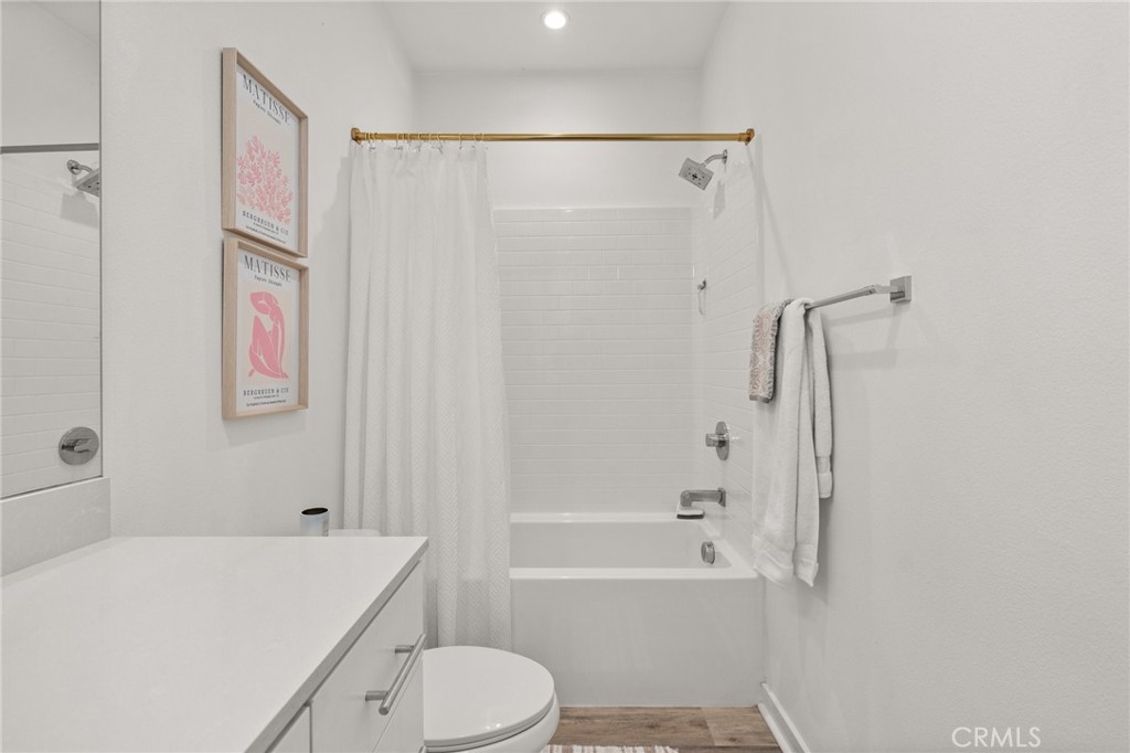 217 Placemark Irvine, CA 92614 - Photo 24 of 39 a bathroom with a sink a toilet and a bathtub