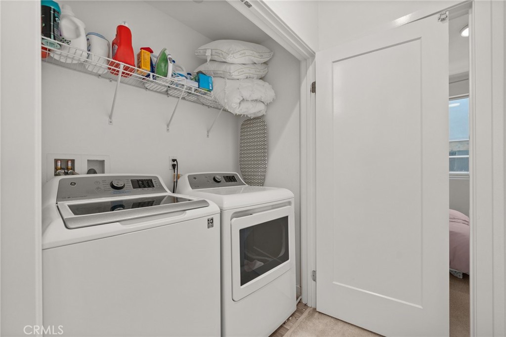 217 Placemark Irvine, CA 92614 - Photo 25 of 39 a utility room with dryer and washer