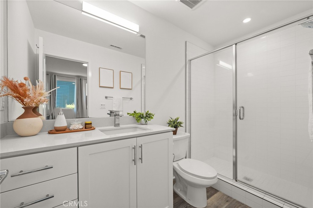 217 Placemark Irvine, CA 92614 - Photo 7 of 39 a bathroom with a sink a toilet and shower