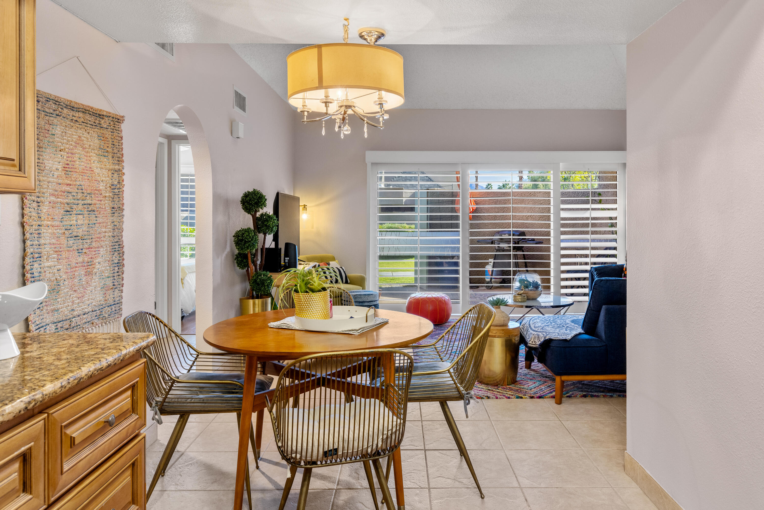 71828 Eleanora Lane Rancho Mirage, CA 92270 - Photo 14 of 37 a view of a dining room with furniture window and outside view
