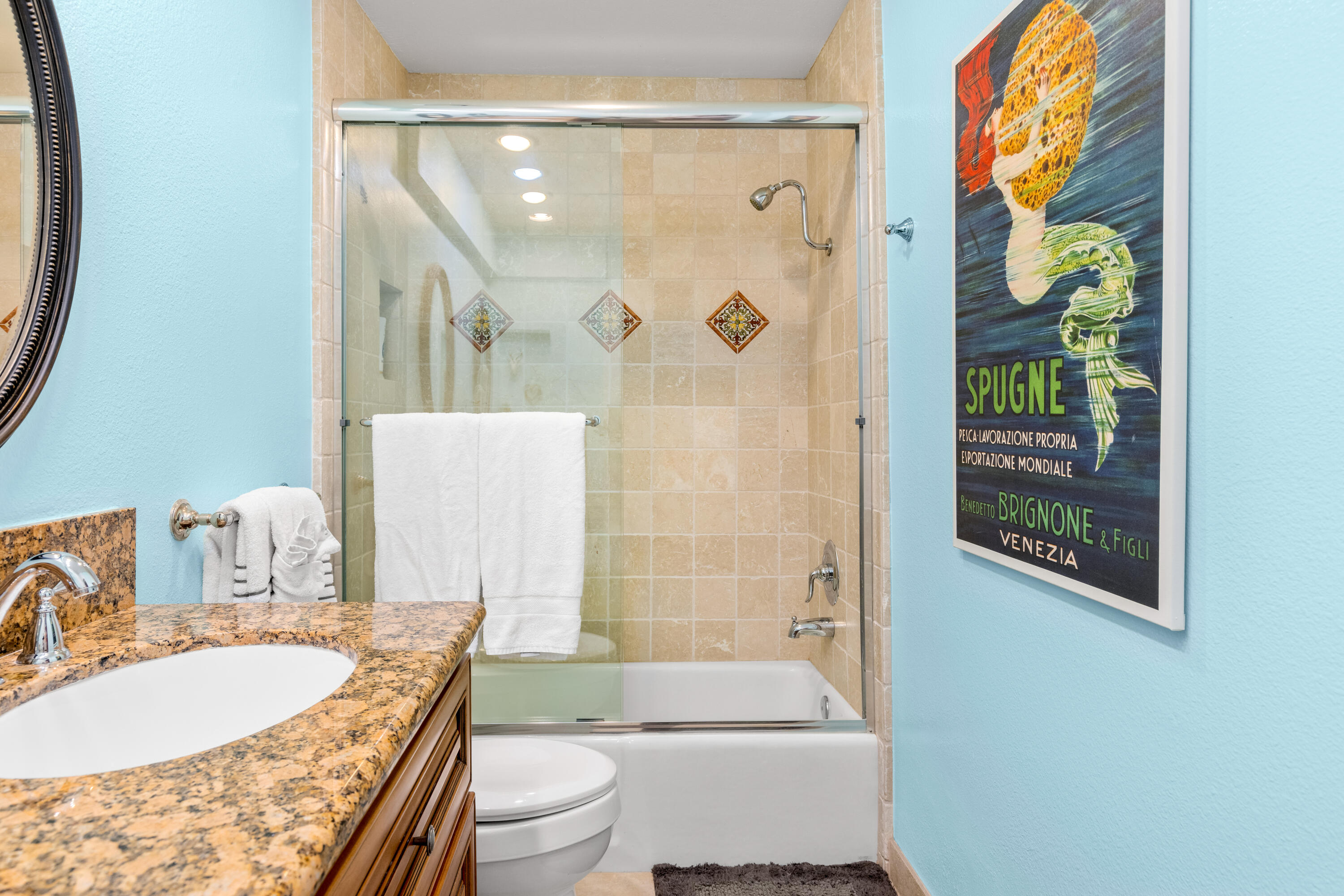 71828 Eleanora Lane Rancho Mirage, CA 92270 - Photo 20 of 37 a bathroom with a granite countertop bathtub sink vanity mirror and toilet