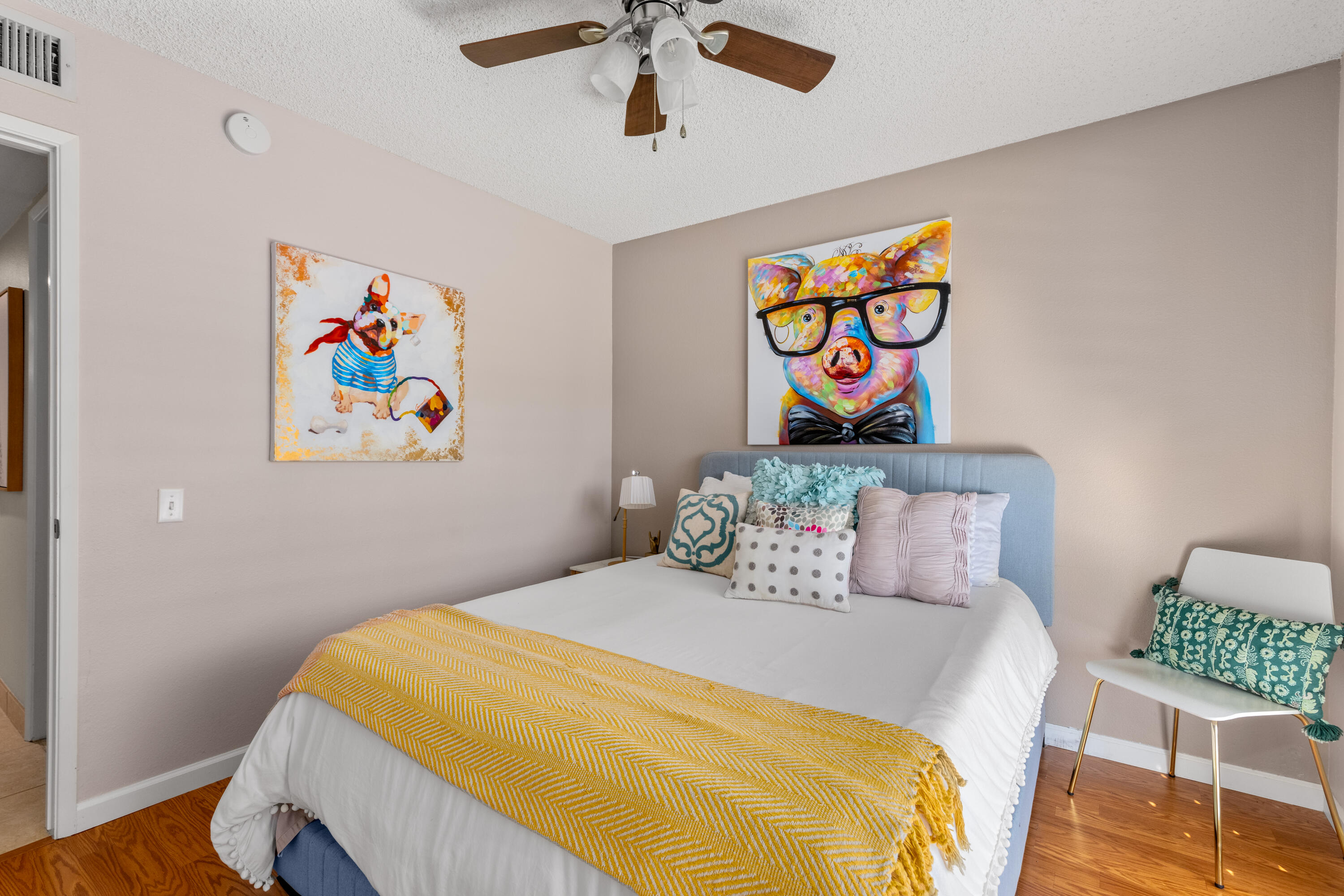 71828 Eleanora Lane Rancho Mirage, CA 92270 - Photo 22 of 37 a bedroom with a bed and a painting on the wall