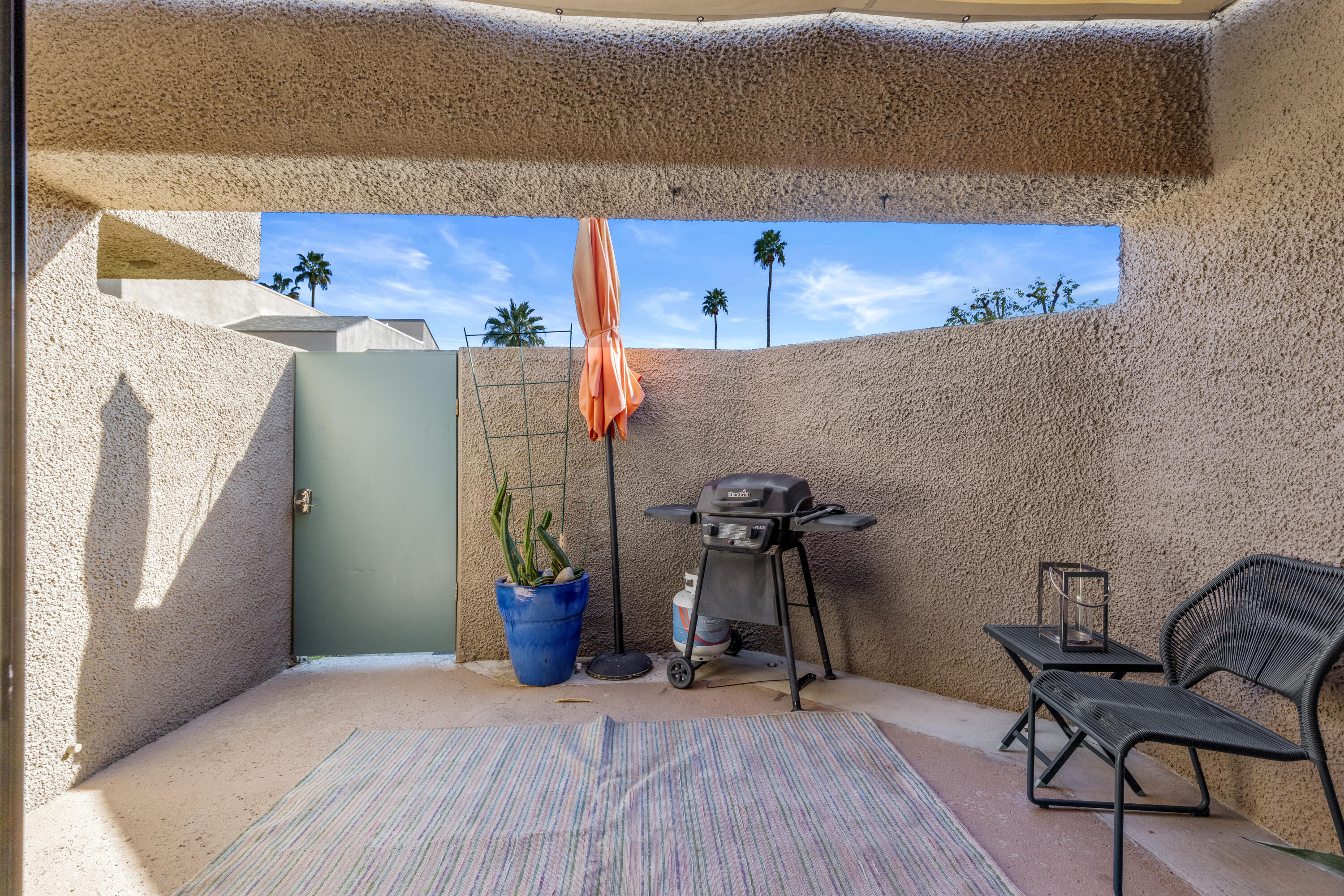 71828 Eleanora Lane Rancho Mirage, CA 92270 - Photo 25 of 37 a view of a room with furniture and wooden floor