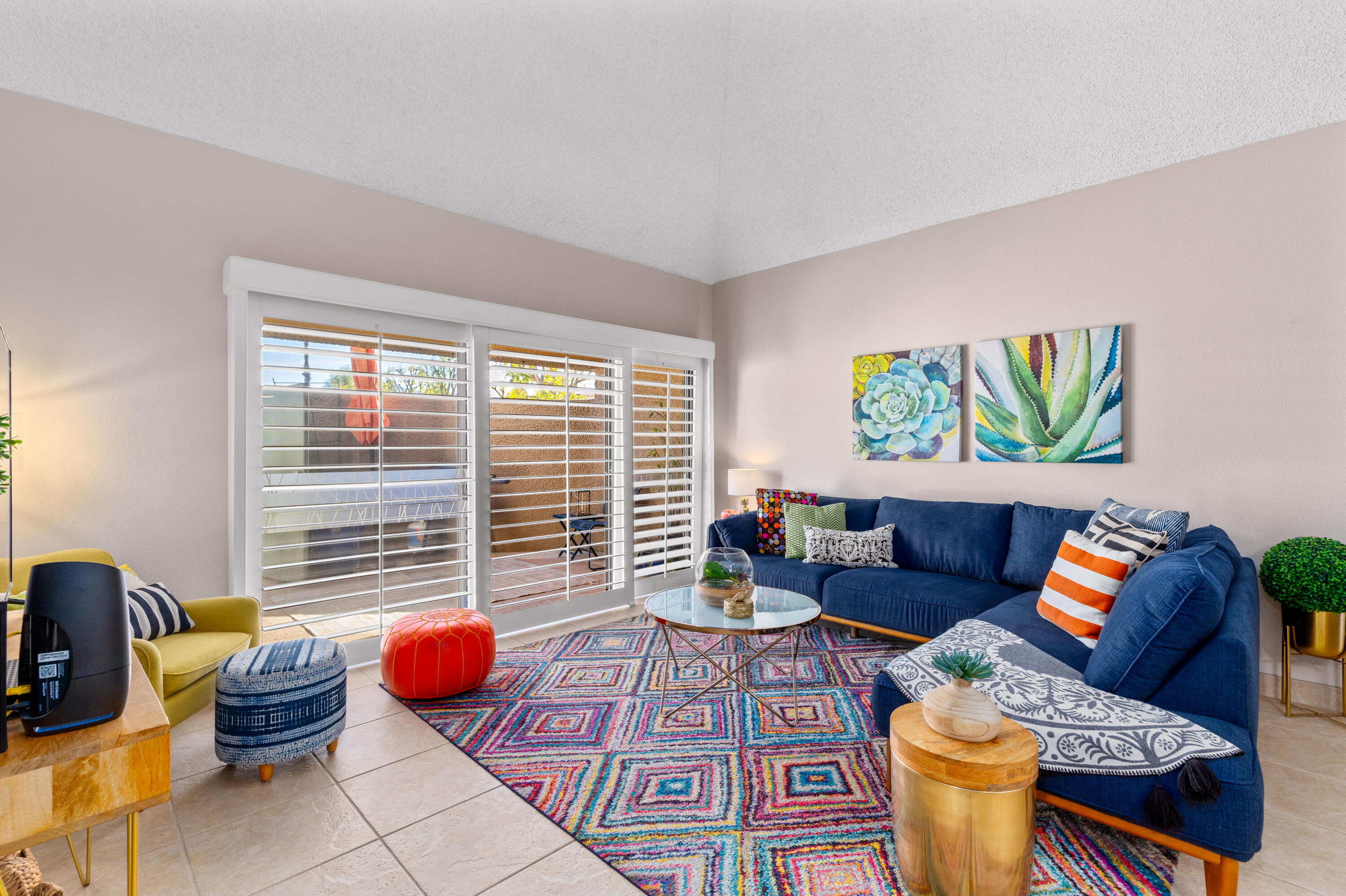 71828 Eleanora Lane Rancho Mirage, CA 92270 - Photo 7 of 37 a living room with furniture and a large window