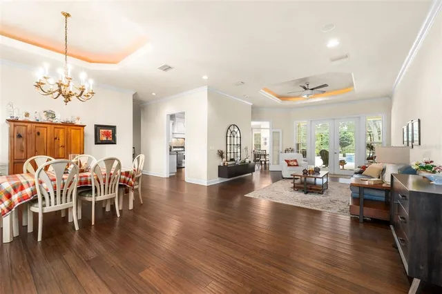 a bathroom with a tub sink shower and mirror