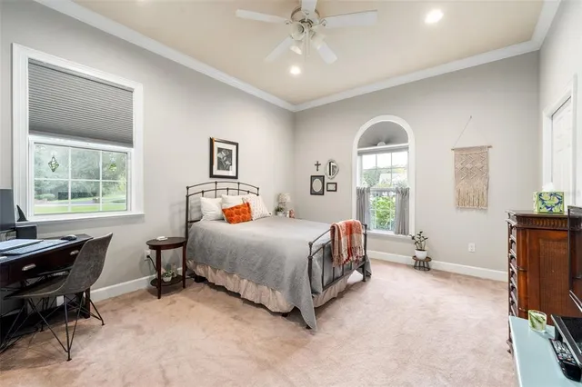 a view of a swimming pool with a yard