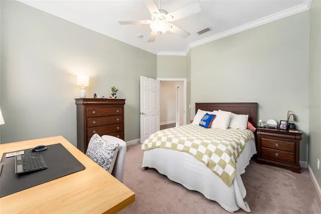 a utility room with cabinets washer and dryer