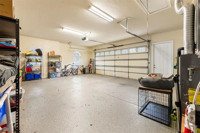 a backyard of a house with a yard and outdoor seating