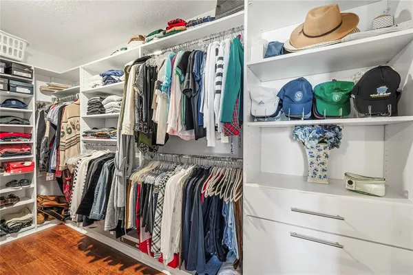a living room with furniture and white walls